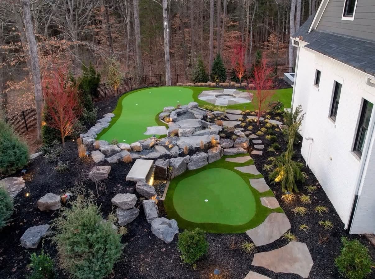 Artificial grass putting green designed for a backyard in the Fort Mill area, ideal for short-game practice at home.